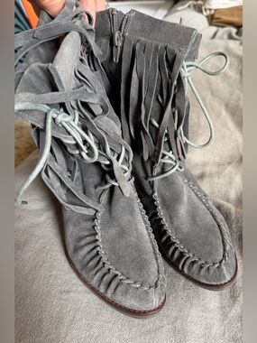 Gray suede, suede tassel, heeled bootie.
